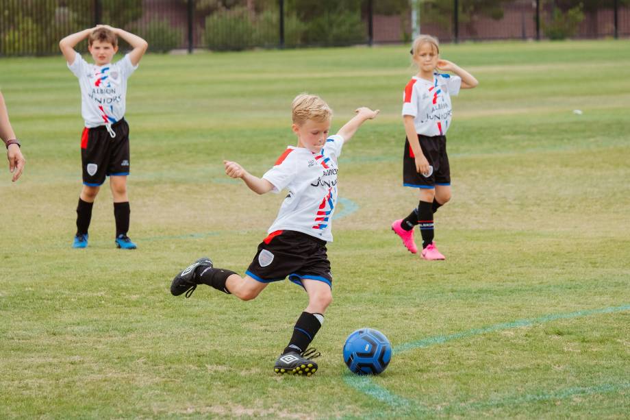Kids play football