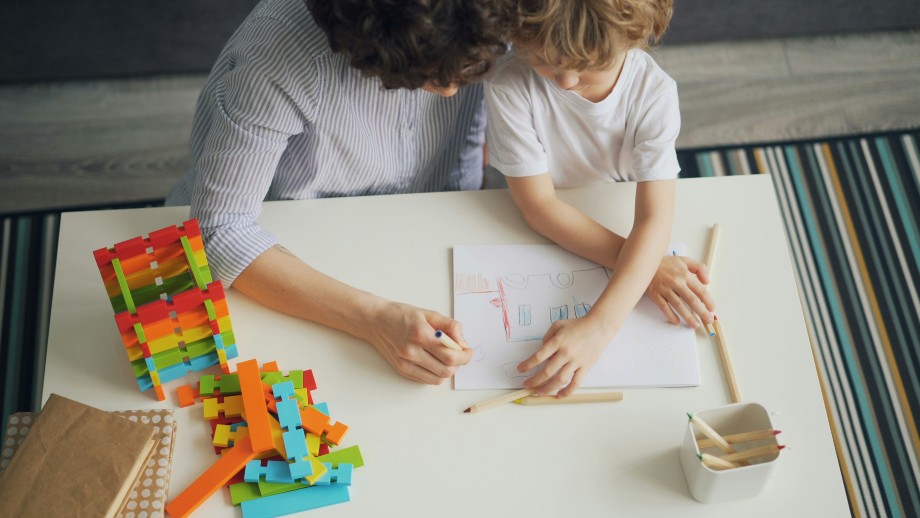 child with Autism with teacher
