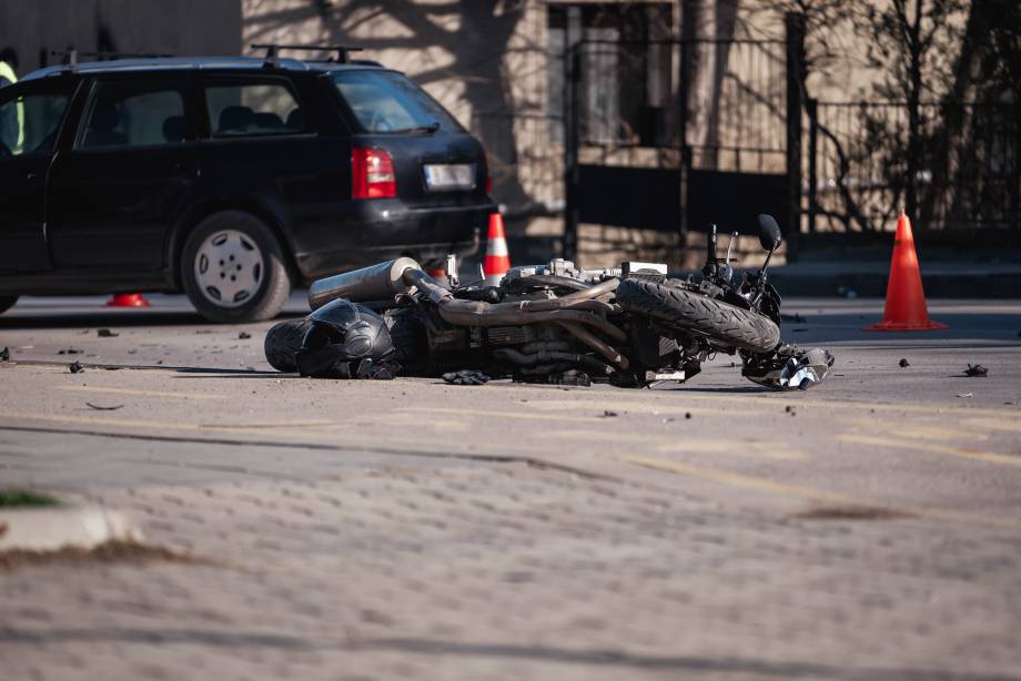 Car accident with motorcycle at a crossroads