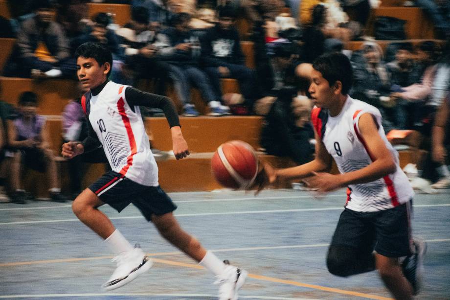 Teenagers Play Basketball