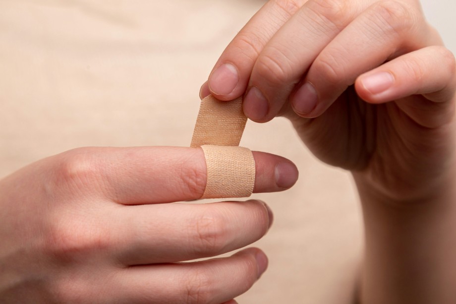 seal the wound with adhesive plaster