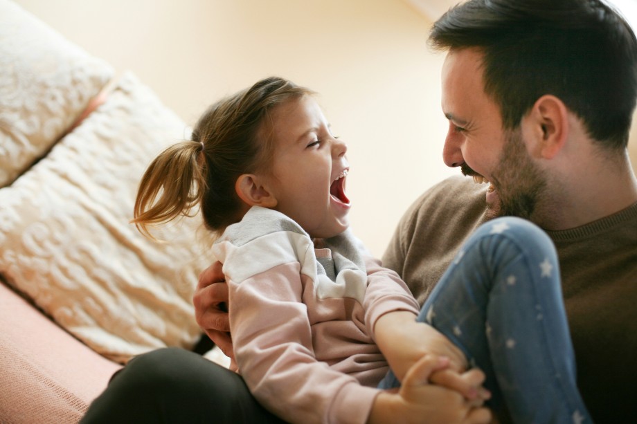 dad with daughter at home