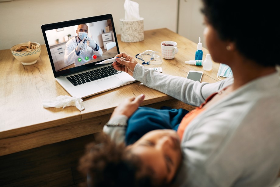 mother having video call with pediatrician